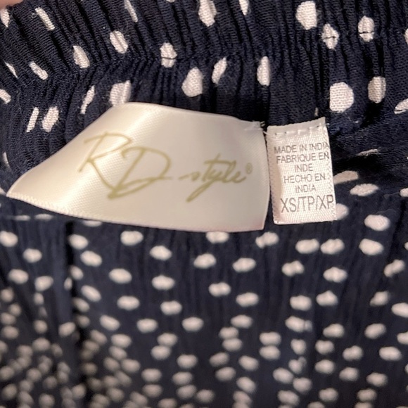 Lulu’s “Digby Navy Blue Polka Dot Flyaway Pants” - Picture 5 of 7